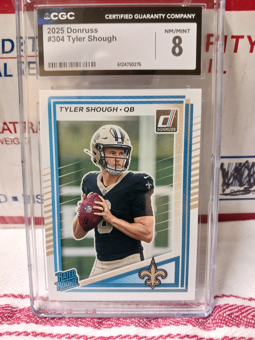 2025 Donruss Tyler Shough Rookie Card - Blue & Gold Accents GRADED CGC 8